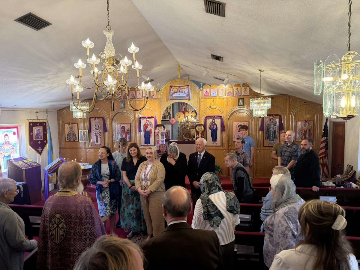 New Parish Council members standing before the iconostasis